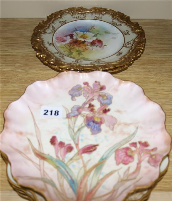 Eight Doulton Burslem flower decorated plates